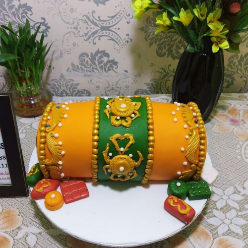 Orange Dhol Shape Fondant Cake in Gurgaon