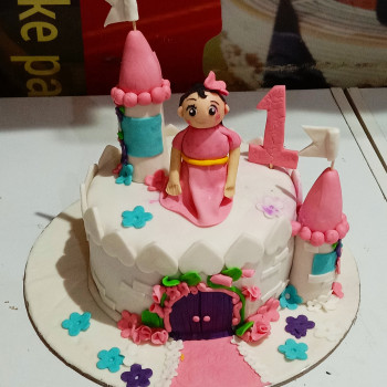 Girl on Castle Fondant Cake